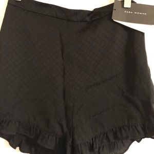 Black size zip shorts